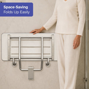 Fold down shower bench folded upright against the wall to save shower space